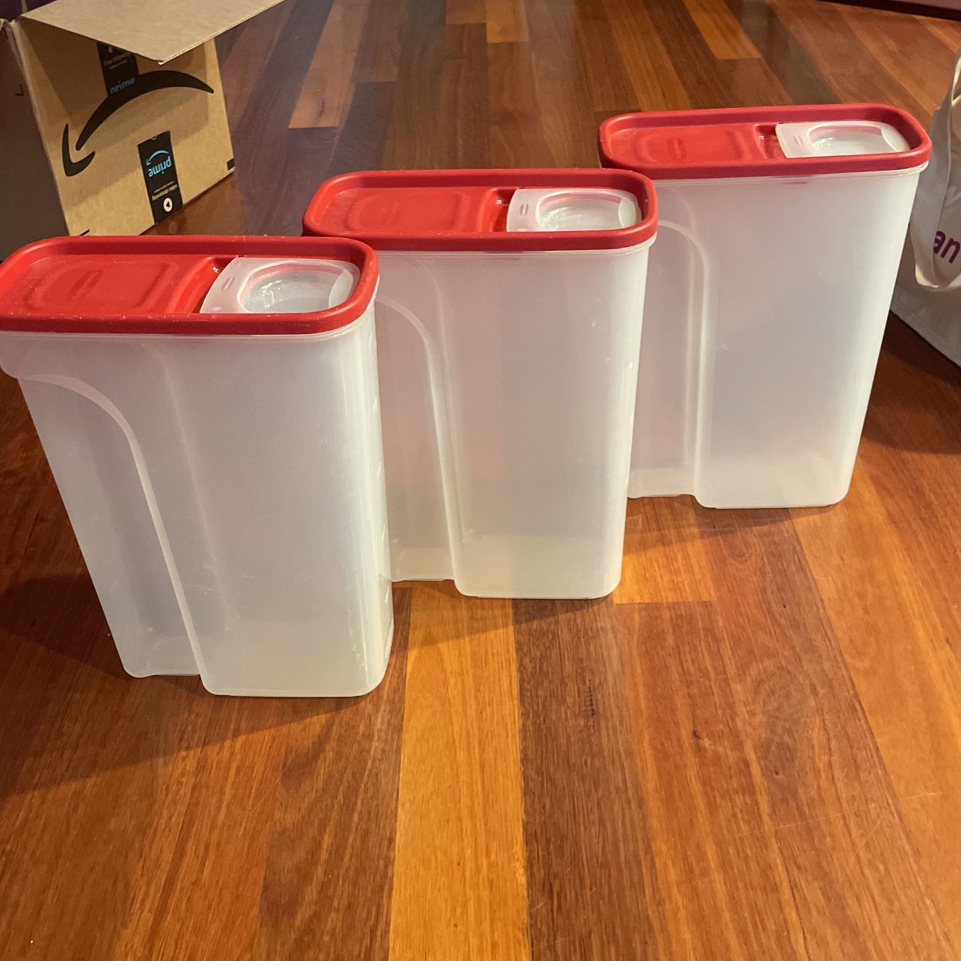 Three Rubbermaid Cereal Containers