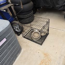 Dog Cage With Dog Bowls Approximately 2 Ft Long By A Foot And A Half Wide And A Foot And A Half High