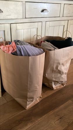 2 Large bags of women’s clothes size Large