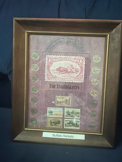 Buffalo nickels and stamps inside a frame