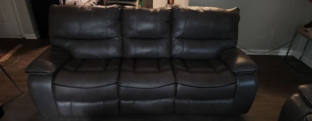 Gray 2 piece reclining sofa and loveseat set