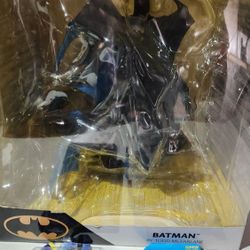 Batman Statue And Cars