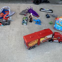 Used Toys (includes Cars Super Track Mack 2-in-1 Transforming Play Set)