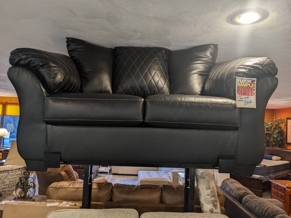 Loveseat. Ashley Furniture. Black. Pleather