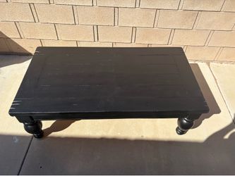 Black Wood coffee table with turned legs $100