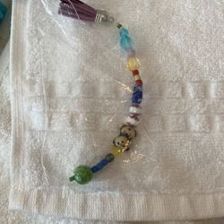 This Is A String With Beads For Holding Itips