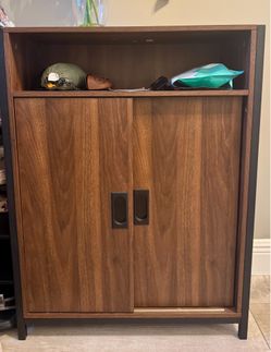 Entry way sliding door cabinet