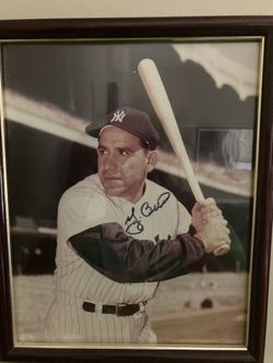 Yogi, Berra sign Autograph $170