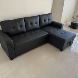 83.5” W BLACK VEGAN LEATHER REVERSIBLE SLEEPER SECTIONAL SOFA