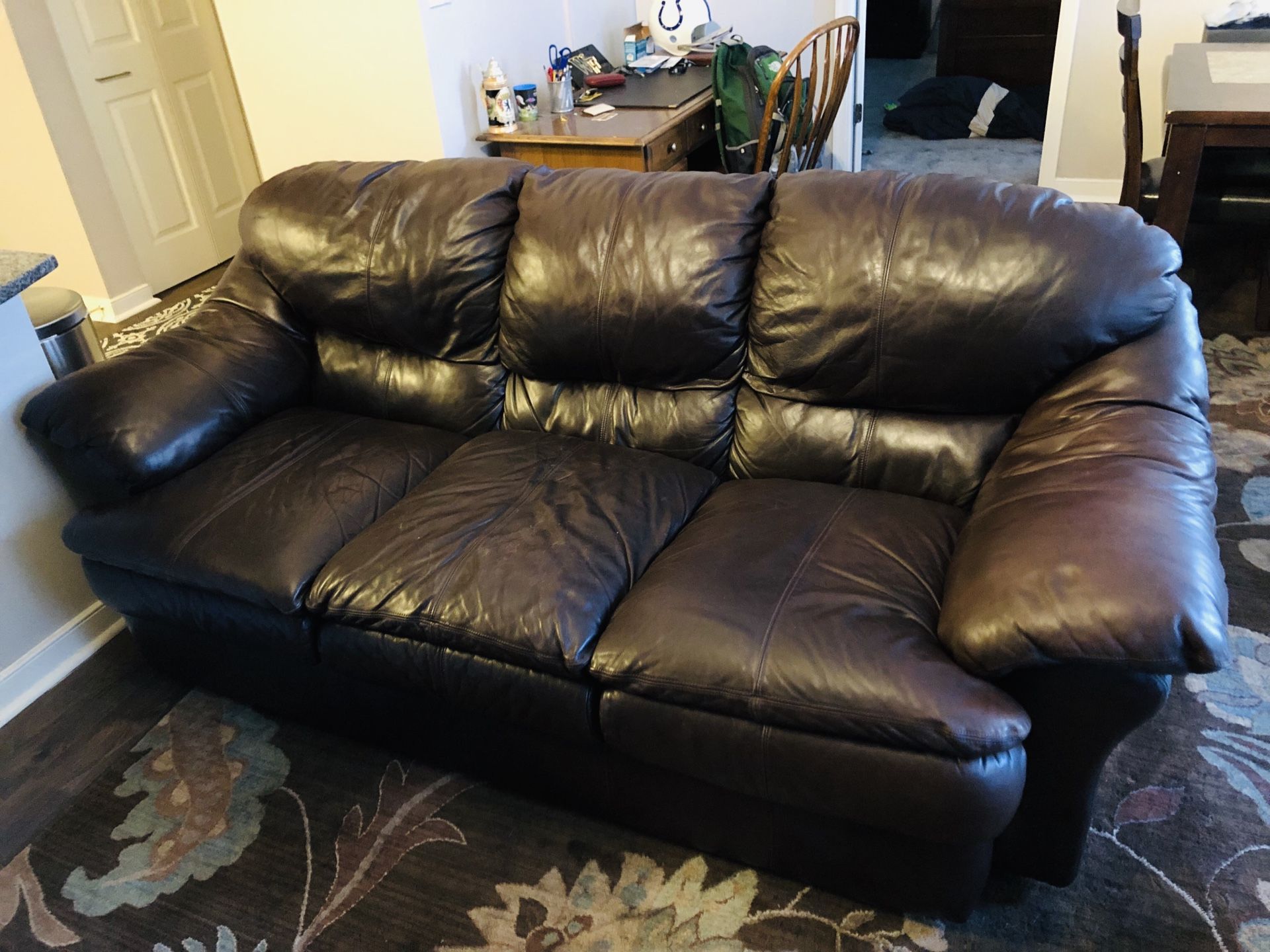 Brown leather couch/sofa