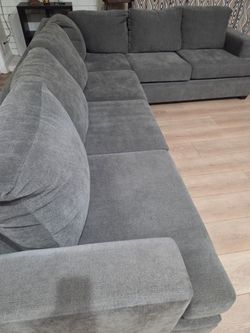 Need to sell asap. Living Spaces sectional sofa.