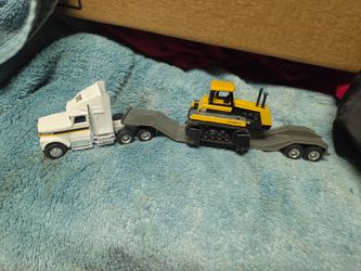 Caterpillar Semi Truck with CAT Challenger 65 on Lowboy Trailer