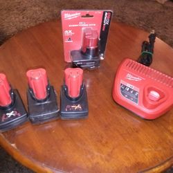 MILWAUKEE M12 CHARGER, (1) GOOD BATTERY, AND (3) BAD BATTERY 