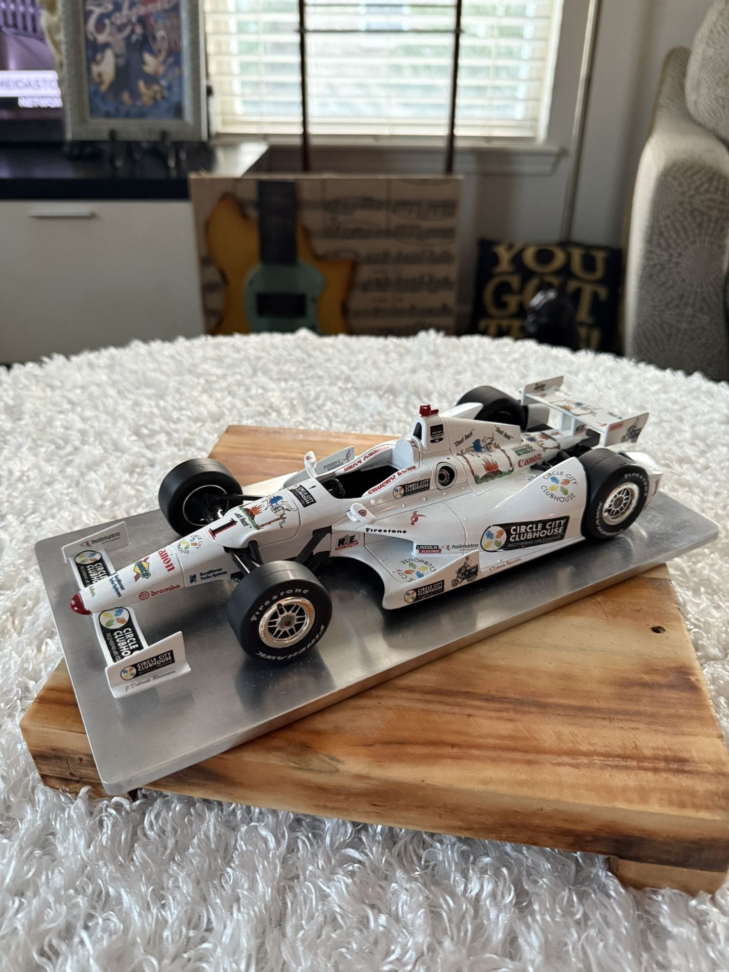 Die-Cast model of 1:18 IndyCar, specifically identified as a UT Models Hogan..