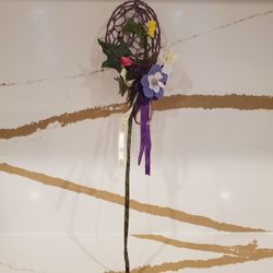 Handmade spring themed floral decoration purple grapevine base adorned faux flowers WAND Decor