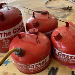 VINTAGE ANTIQUE GAS CANS 