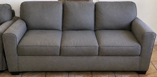 Price Very Negotiable - Gray Sofa