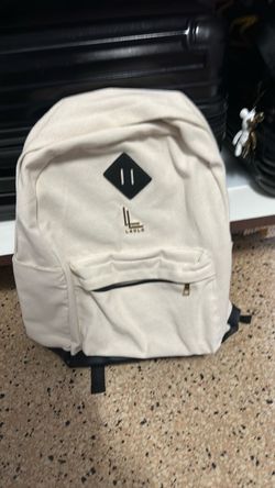 Beige travel backpack