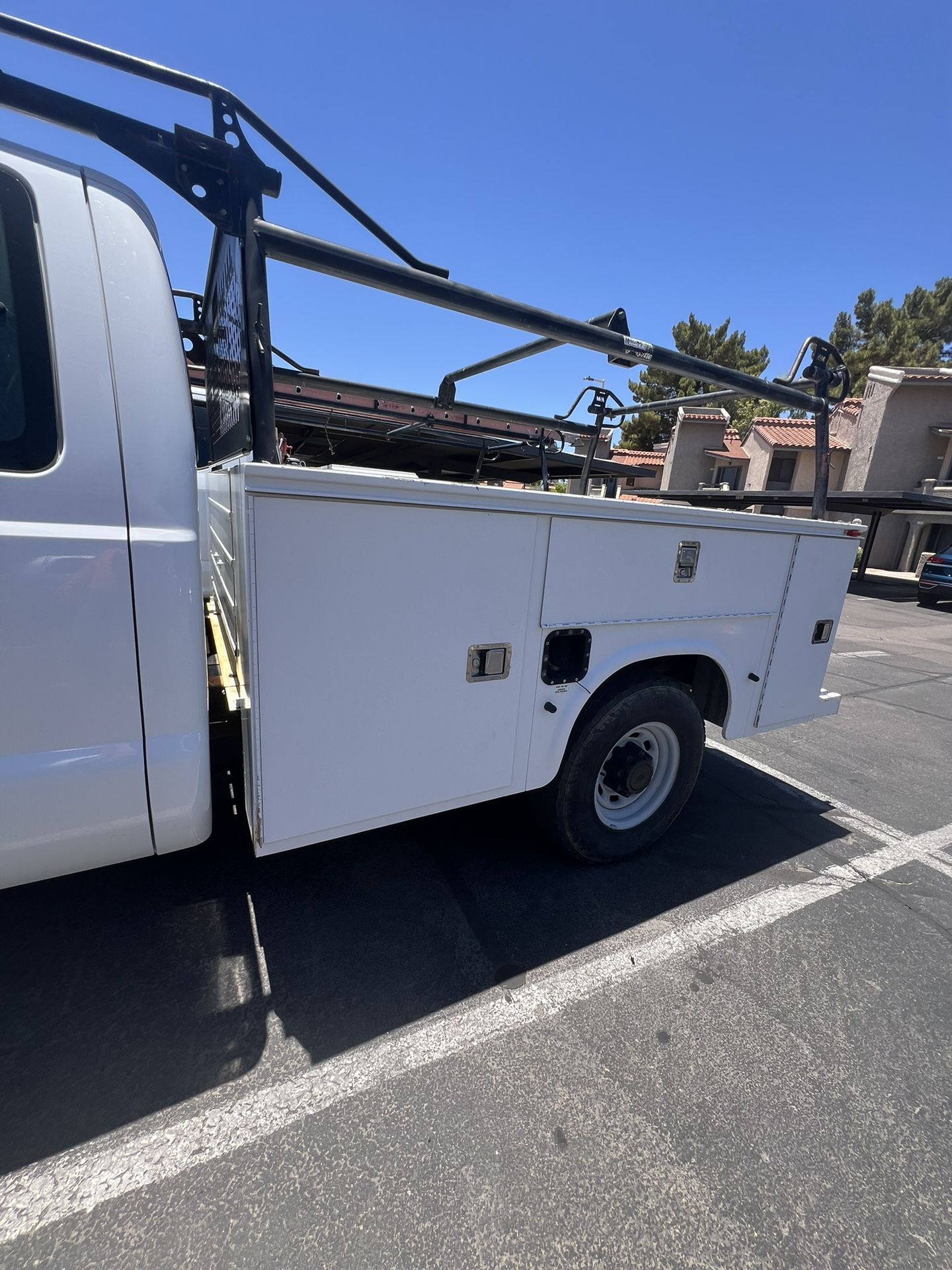 F250 utility long bed and ladder rack