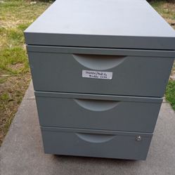 Metal file cabinet $ 60
