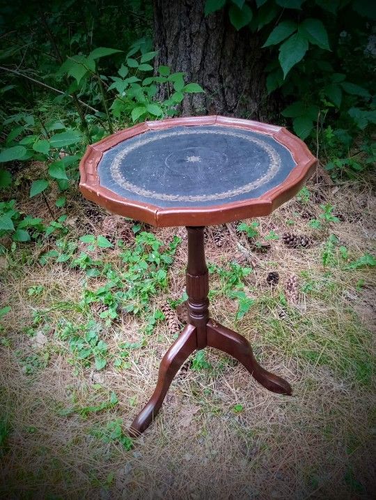 Mahogany & tooled leather stenciling tripod candle stand