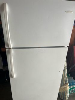 White refrigerator working  condition