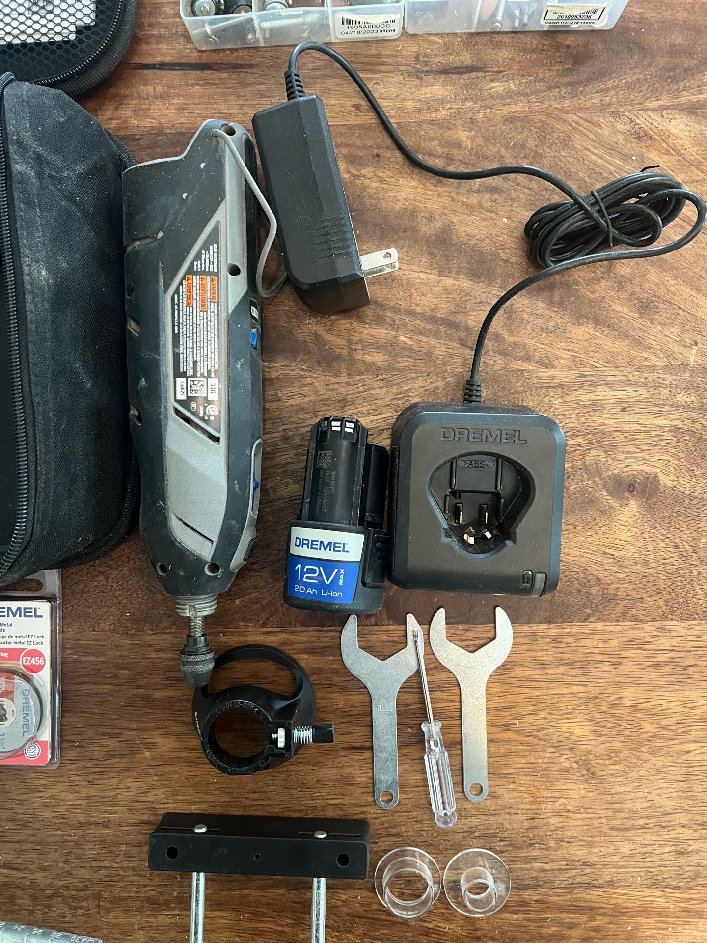 Dremel + Drill Press + Plunge Base + Circle cutting jig + Straight Edge + multi cutting tool + router bits Kit + 100 sanding bits