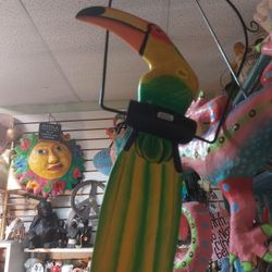 Cool Hanging Colorful Toucan On A Swing 