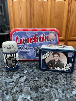 Vandor Elvis Presley Lunchtime Pair of Salt and Pepper Shakers in a Tin. Brand new never used. Has been on display in a cabinet with a very large sa