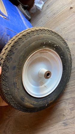 Spare tire for wheel barrel