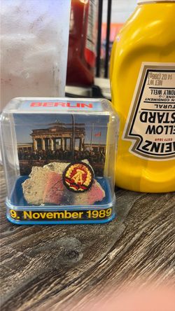 piece of the Berlin wall with stamp of Berlin wall certification