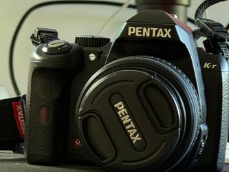 Pentax K-r and lens SMC DAL 18-55. 9k Shutters.