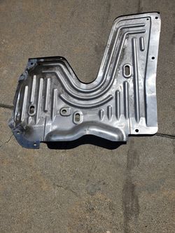 Splash shield under cover