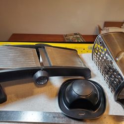 OXO GOOD GRIPS Chef's Mandoline Slicer Stainless Steel Used 1 Time + stainless steel, four-sided box grater 9" 
great gift idea for Moms or cookers.
n