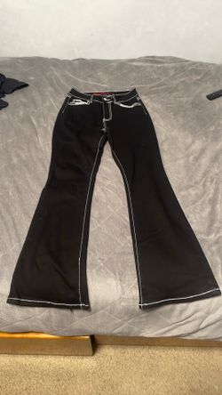 wings on back pockets black flare jeans
