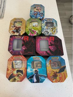 Pokemon tins with random cards