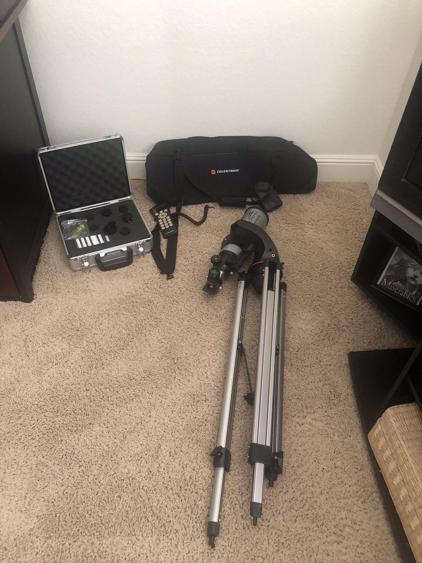 Celestron NexStar Telescope model 22082 with tripod , 8 piece lens kit, color filter remote and carrying case