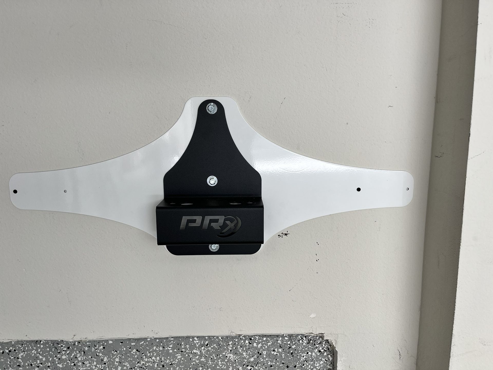 PRx Performance Wall Mounted Spotter Arm Storage with White Backing Plate