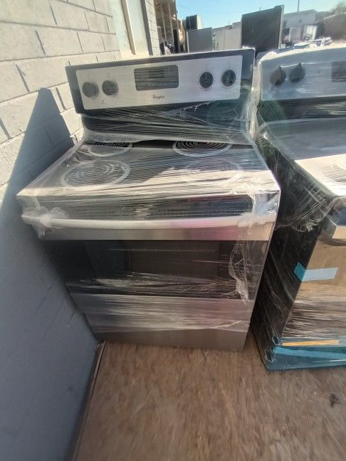 WHIRLPOOL STAINLESS STILL ELECTRIC STOVE 