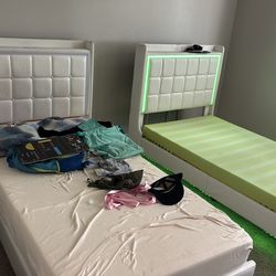 Two twin size led floating beds!