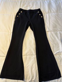 Black pants with gold buttons