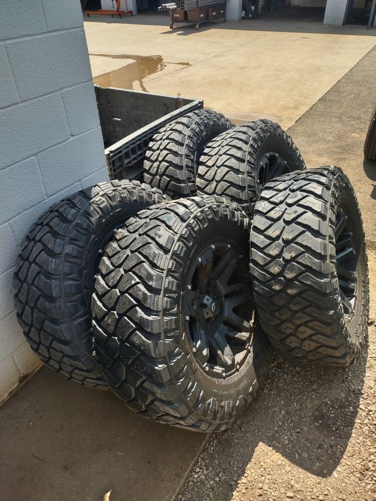 5 Tires And Wheels Off Jeep JK