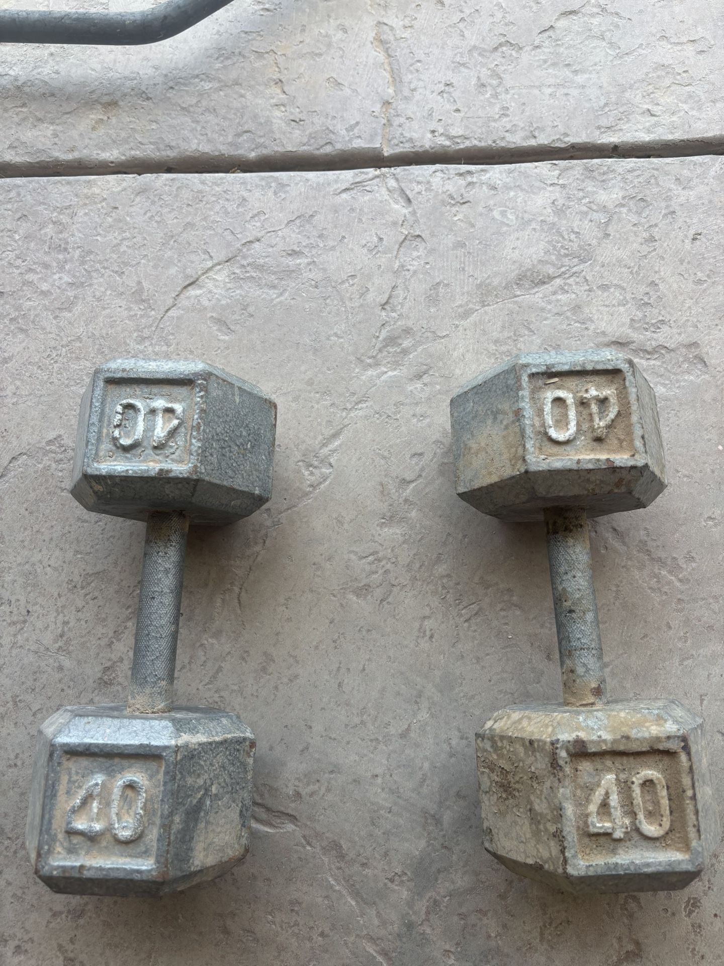 40 pound stone dumbbells💪