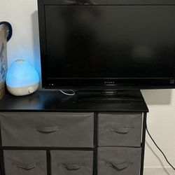 Tv And Small Dresser