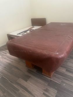 Pool Table with Burgundy Cover and Wood Base