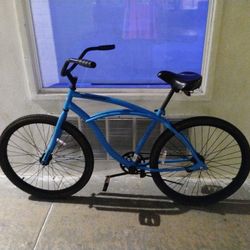 Huffy Blue beach cruiser bicycle 