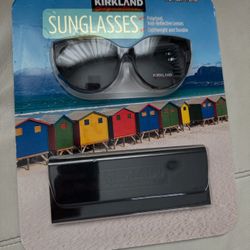 Sunglasses. New. Polarized. Lightweight. Comes with a case. Sealed in box !