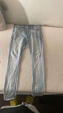Light Wash Slim Jeans with Cross Embellishments