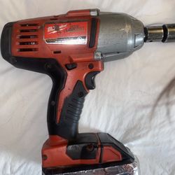 Milwaukee 1/2” impact drill with battery