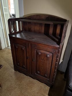 carved oak corner cabinet / sideboard